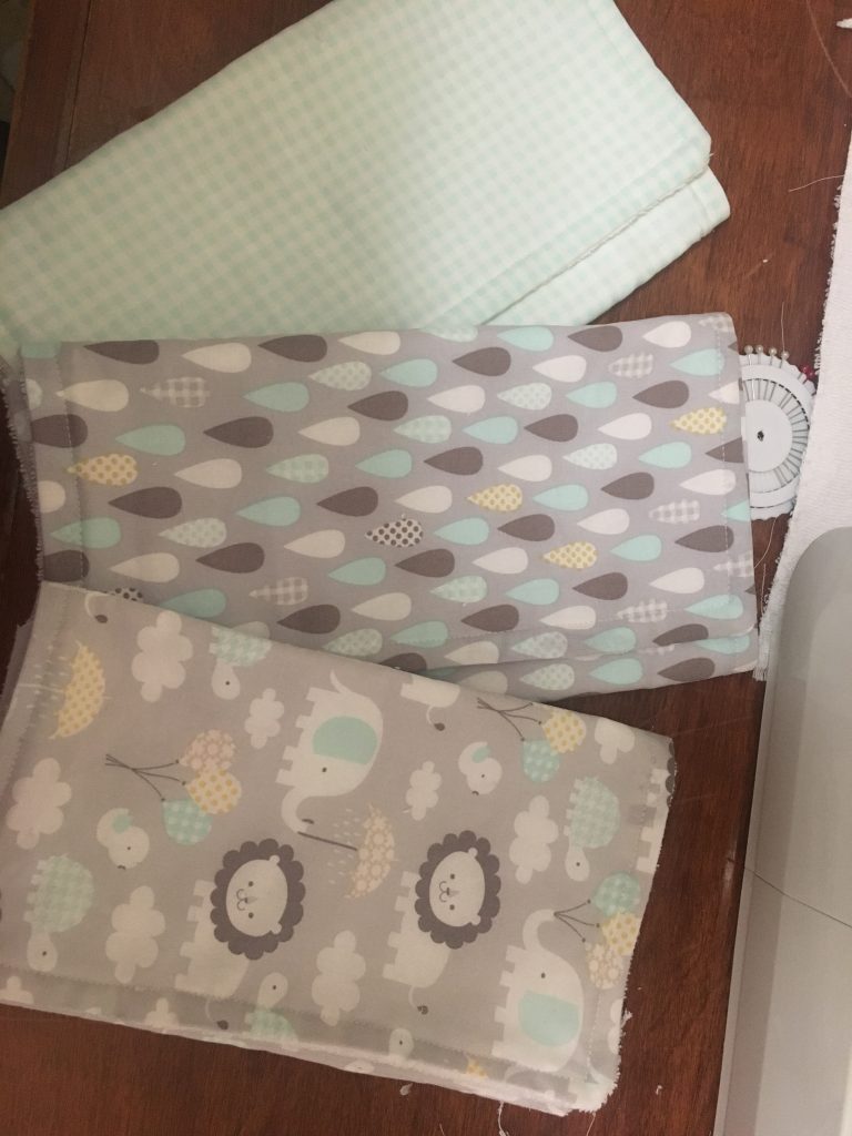 blue and gray baby burp cloths